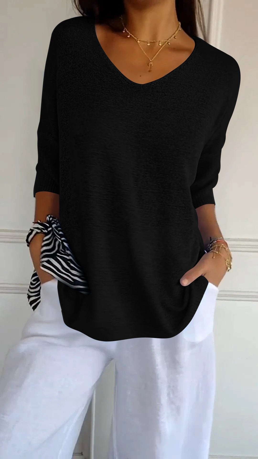 Solid knit top with V-neck